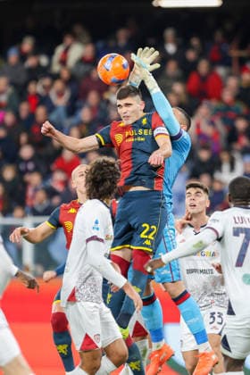 GenoaÕs Johan Vasquez fights for the ball with Cagliari s goalkeeper Elia Caprile during the Serie A soccer match between Genoa and Cagliari at the Luigi Ferraris Stadium in Genoa, Italy - Monday, January 12, 2026. - Soccer .  Copyright: xTanoxPecoraro LaPressex