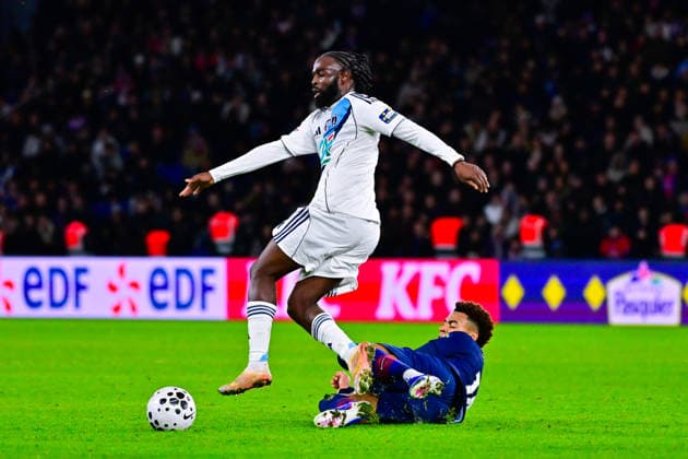 FOOTBALL : PSG vs PFC - Coupe de France - 12 01 2026 Jonathan Ikone ( PFC ) and Desire Doue ( PSG ) during the French Cup match between Paris Saint Germain and Paris Football Club at Parc Des Princes on January 12 , 2026 in Paris, France. ( Photo by Federico Pestelini PsnewZ ) - ParisFrance  Copyright: xFedericoxPestelinix