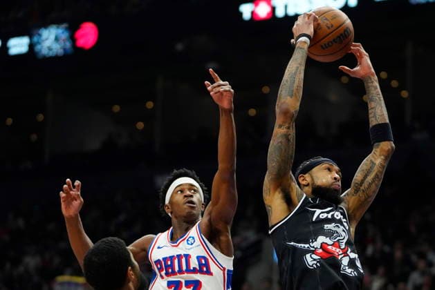 January 12, 2026, Toronto, On, CANADA: Toronto Raptors forward Brandon Ingram (3) rebounds against Philadelphia 76ers guard Vj Edgecombe (77) during first half NBA, Basketball Herren, USA basketball action in Toronto, Monday, Jan. 12, 2026. Canada News - January 12, 2026 - ZUMAc35_ 20260112_zaf_c35_068 Copyright: xFrankxGunnx