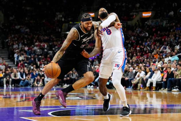 January 12, 2026, Toronto, On, CANADA: Philadelphia 76ers forward Paul George (8) fouls Toronto Raptors forward Brandon Ingram (3) during first half NBA, Basketball Herren, USA basketball action in Toronto, Monday, Jan. 12, 2026. Canada News - January 12, 2026 - ZUMAc35_ 20260112_zaf_c35_075 Copyright: xFrankxGunnx