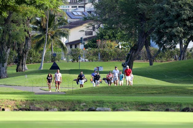January 12, 2026 - Collin Morikawas group walks down the 8th hole during a Practice Round prior to the 2026 Sony Open in Hawaii at Waialae Country Club in Honolulu, HI - CSM Honolulu USA - ZUMAc04_ 20260112_zma_c04_014 Copyright: xAndrewxLeex