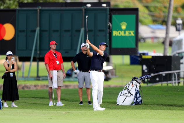January 12, 2026 - Daniel Henney hits from the 8th fairway as his wife Ru Kumagai records a video during a Pro-Am prior to the 2026 Sony Open in Hawaii at Waialae Country Club in Honolulu, HI - CSM Honolulu USA - ZUMAc04_ 20260112_zma_c04_036 Copyright: xAndrewxLeex