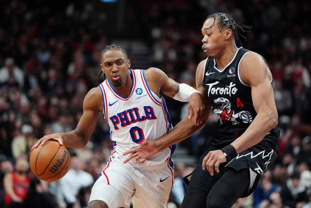 January 12, 2026, Toronto, On, CANADA: Philadelphia 76ers guard Tyrese Maxey (0) moves the ball past Toronto Raptors forward guard Scottie Barnes (4) during second half NBA, Basketball Herren, USA basketball action in Toronto, Monday, Jan. 12, 2026. Canada News - January 12, 2026 - ZUMAc35_ 20260112_zaf_c35_079 Copyright: xFrankxGunnx