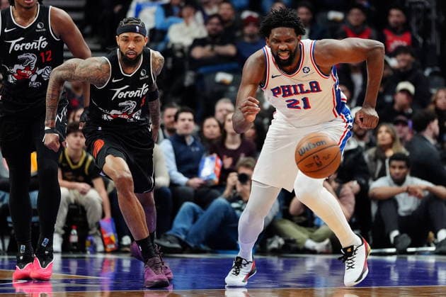 January 12, 2026, Toronto, On, CANADA: Toronto Raptors forward Brandon Ingram (3) and Philadelphia 76ers centre forward Joel Embiid (21) vie for a loose ball during first half NBA, Basketball Herren, USA basketball action in Toronto, Monday, Jan. 12, 2026. Canada News - January 12, 2026 - ZUMAc35_ 20260112_zaf_c35_084 Copyright: xFrankxGunnx