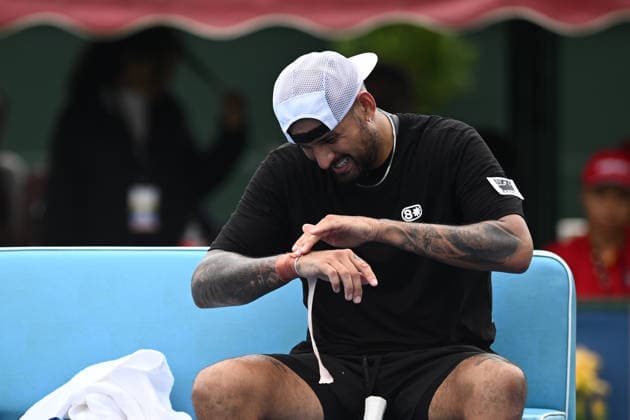 TENNIS KOOYONG CLASSIC, Nick Kyrgios of Australia puts strapping on his wrist during a break in play against Zhang Zhizhen of China during the Kooyong Classic at the Kooyong Lawn Tennis Club in Melbourne, Tuesday, January 13, 2026. ( NO ARCHIVING, EDITORIAL USE ONLY MELBOURNE VICTORIA AUSTRALIA  Copyright: xJOELxCARRETTx 20260113115154727621