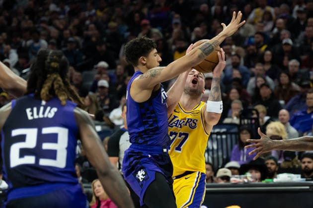January 12, 2026, Sacramento, Ca, USA: Los Angeles Lakers guard Luka Doncic (77) is fouled bySacramento Kings guard Nique Clifford (5) in the second half during a game at the Golden 1 Center on Monday, Jan. 12, 2026 in Sacramento. Sacramento USA - ZUMAj89_ 20260112_zaf_j89_002 Copyright: xPaulxKitagakixJr.x