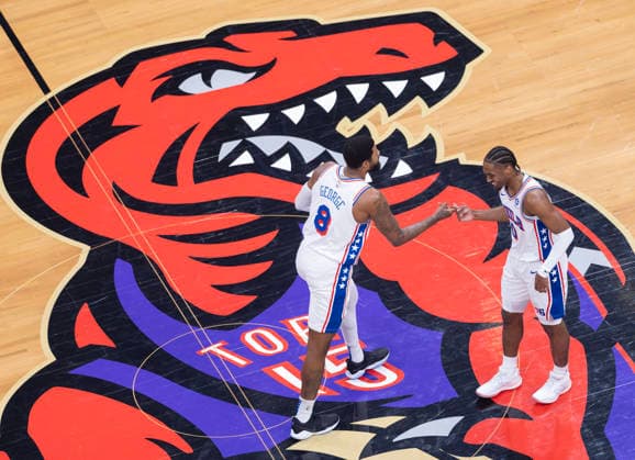 (260113) -- TORONTO, Jan. 13, 2026 -- Paul George (L) and Tyrese Maxey of Philadelphia 76ers celebrate scoring during the 2025-2026 NBA, Basketball Herren, USA regular season game between Toronto Raptors and Philadelphia 76ers in Toronto, Canada, on Jan. 12, 2026. (Photo by Xinhua) (SP)CANADA-TORONTO-BASKETBALL-NBA-76ERS VS RAPTORS ZouxZheng 