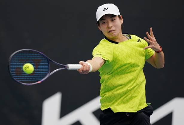 (260113) -- MELBOURNE, Jan. 13, 2026 -- Bai Zhuoxuan of China hits a return during the women s singles qualifying 1st round match against Alina Korneeva of Russia at Australian Open tennis tournament in Melbourne, Australia, Jan. 13, 2026. (Photo by Xinhua) (SP)AUSTRALIA-MELBOURNE-TENNIS-AUSTRALIAN OPEN-WOMEN S SINGLES-QUALIFYING WangxShen 