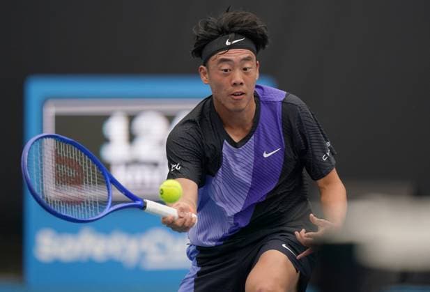 (260113) -- MELBOURNE, Jan. 13, 2026 -- Coleman Wong of China s Hong Kong hits a return during the men s singles qualifying 1st round match against Ugo Blanchet of France at Australian Open tennis tournament in Melbourne, Australia, Jan. 13, 2026. (Photo by Xinhua) (SP)AUSTRALIA-MELBOURNE-TENNIS-AUSTRALIAN OPEN-MEN S SINGLES-QUALIFYING WangxShen 