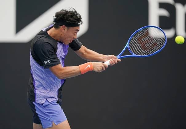 (260113) -- MELBOURNE, Jan. 13, 2026 -- Coleman Wong of China s Hong Kong hits a return during the men s singles qualifying 1st round match against Ugo Blanchet of France at Australian Open tennis tournament in Melbourne, Australia, Jan. 13, 2026. (Photo by Xinhua) (SP)AUSTRALIA-MELBOURNE-TENNIS-AUSTRALIAN OPEN-MEN S SINGLES-QUALIFYING WangxShen 