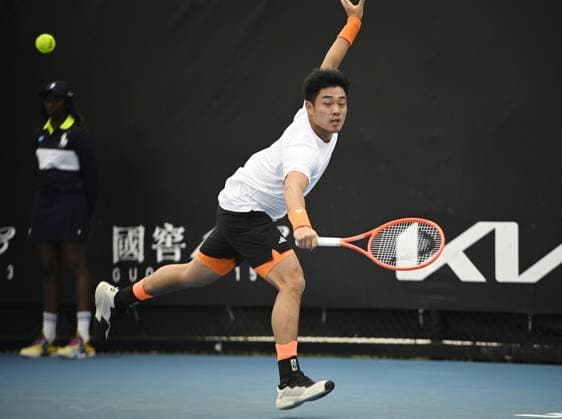 (260113) -- MELBOURNE, Jan. 13, 2026 -- Wu Yibing of China hits a return during the men s singles qualifying 1st round match against Mitchell Krueger of the United States at Australian Open tennis tournament in Melbourne, Australia, Jan. 13, 2026. (Photo by Xinhua) (SP)AUSTRALIA-MELBOURNE-TENNIS-AUSTRALIAN OPEN-MEN S SINGLES-QUALIFYING WangxShen 
