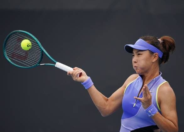 (260113) -- MELBOURNE, Jan. 13, 2026 -- Yuan Yue of China hits a return during the women s singles qualifying 1st round match against Louisa Chirico of the United States at Australian Open tennis tournament in Melbourne, Australia, Jan. 13, 2026. (Photo by Xinhua) (SP)AUSTRALIA-MELBOURNE-TENNIS-AUSTRALIAN OPEN-WOMEN S SINGLES-QUALIFYING WangxShen 