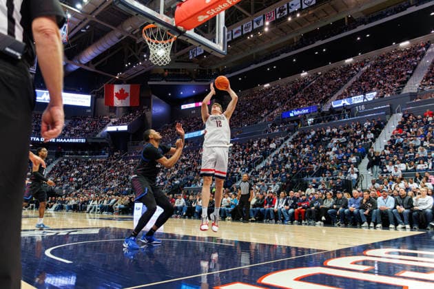DePaul V Connecticut Eric Reibe, number 12 of the Connecticut Huskies, drives to the rim against the DePaul Blue Demons during the second half of an NCAA, College League, USA men s basketball game at PeoplesBank Arena in Hartford, Connecticut, on January 10, 2026. Hartford, Connecticut United States  Copyright: xFedericoxTorresx originalFilename:torres-notitle260110_npwoN.jpg