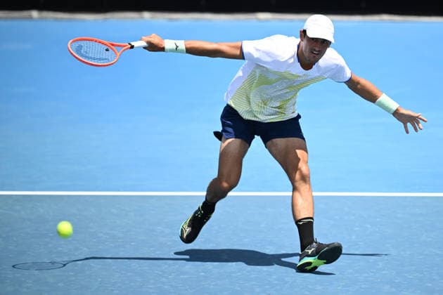 TENNIS AUSTRALIAN OPEN QUALIFYING, Bernard Tomic of Australia in action against Arthur Fery of Great Britain during a qualifying session ahead of the Australian Open tennis tournament at Melbourne Park in Melbourne, Wednesday, January 14, 2026. ( NO ARCHIVING, EDITORIAL USE ONLY MELBOURNE VICTORIA AUSTRALIA  Copyright: xJOELxCARRETTx 20260114191104197387