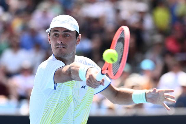 TENNIS AUSTRALIAN OPEN QUALIFYING, Bernard Tomic of Australia in action against Arthur Fery of Great Britain during a qualifying session ahead of the Australian Open tennis tournament at Melbourne Park in Melbourne, Wednesday, January 14, 2026. ( NO ARCHIVING, EDITORIAL USE ONLY MELBOURNE VICTORIA AUSTRALIA  Copyright: xJOELxCARRETTx 20260114131530146667