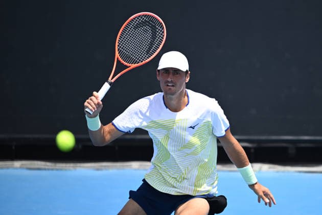 TENNIS AUSTRALIAN OPEN QUALIFYING, Bernard Tomic of Australia in action against Arthur Fery of Great Britain during a qualifying session ahead of the Australian Open tennis tournament at Melbourne Park in Melbourne, Wednesday, January 14, 2026. ( NO ARCHIVING, EDITORIAL USE ONLY MELBOURNE VICTORIA AUSTRALIA  Copyright: xJOELxCARRETTx 20260114189527993191