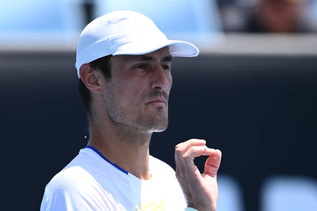 TENNIS AUSTRALIAN OPEN QUALIFYING, Bernard Tomic of Australia in action against Arthur Fery of Great Britain during a qualifying session ahead of the Australian Open tennis tournament at Melbourne Park in Melbourne, Wednesday, January 14, 2026. ( NO ARCHIVING, EDITORIAL USE ONLY MELBOURNE VICTORIA AUSTRALIA  Copyright: xJOELxCARRETTx 20260114148200779248