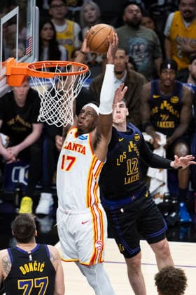January 13, 2026, Los Angeles, California, USA: Atlanta Hawks Onyeka Okongwu (17) dunks against the Los Angeles Lakers during an NBA, Basketball Herren, USA basketball game at Crypto.com Arena on Tuesday, Jan. 13, 2026 in Los Angeles. Los Angeles USA - ZUMAc68_ 20260113_zaf_c68_061 Copyright: xRingoxChiux