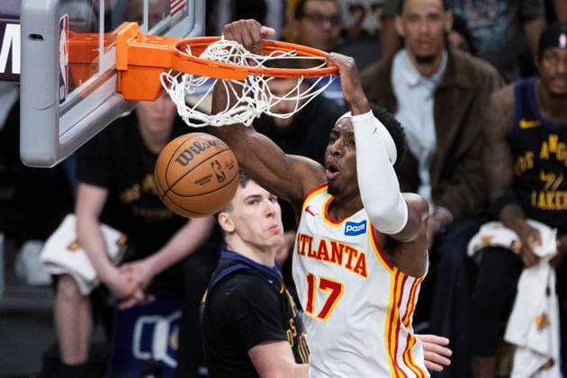 January 13, 2026, Los Angeles, California, USA: Atlanta Hawks Onyeka Okongwu (17) dunks against the Los Angeles Lakers during an NBA, Basketball Herren, USA basketball game at Crypto.com Arena on Tuesday, Jan. 13, 2026 in Los Angeles. Los Angeles USA - ZUMAc68_ 20260113_zaf_c68_075 Copyright: xRingoxChiux
