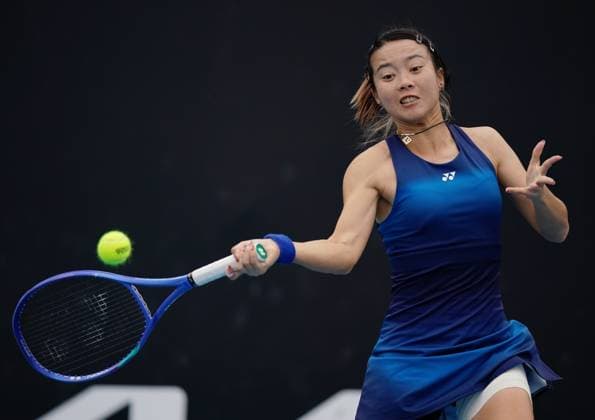 (260114) -- MELBOURNE, Jan. 14, 2026 -- Ma Yexin of China hits a return during the women s singles qualifying 2nd round match against Elvina Kalieva of the United States at Australian Open tennis tournament in Melbourne, Australia, Jan. 14, 2026. (Photo by Xinhua) (SP)AUSTRALIA-MELBOURNE-TENNIS-AUSTRALIAN OPEN-WOMEN S SINGLES-QUALIFYING WangxShen 