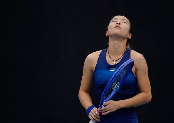 (260114) -- MELBOURNE, Jan. 14, 2026 -- Ma Yexin of China reacts during the women s singles qualifying 2nd round match against Elvina Kalieva of the United States at Australian Open tennis tournament in Melbourne, Australia, Jan. 14, 2026. (Photo by Xinhua) (SP)AUSTRALIA-MELBOURNE-TENNIS-AUSTRALIAN OPEN-WOMEN S SINGLES-QUALIFYING WangxShen 