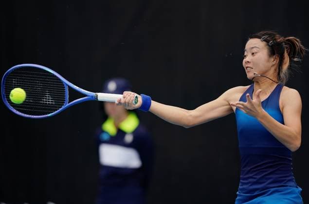 (260114) -- MELBOURNE, Jan. 14, 2026 -- Ma Yexin of China hits a return during the women s singles qualifying 2nd round match against Elvina Kalieva of the United States at Australian Open tennis tournament in Melbourne, Australia, Jan. 14, 2026. (Photo by Xinhua) (SP)AUSTRALIA-MELBOURNE-TENNIS-AUSTRALIAN OPEN-WOMEN S SINGLES-QUALIFYING WangxShen 