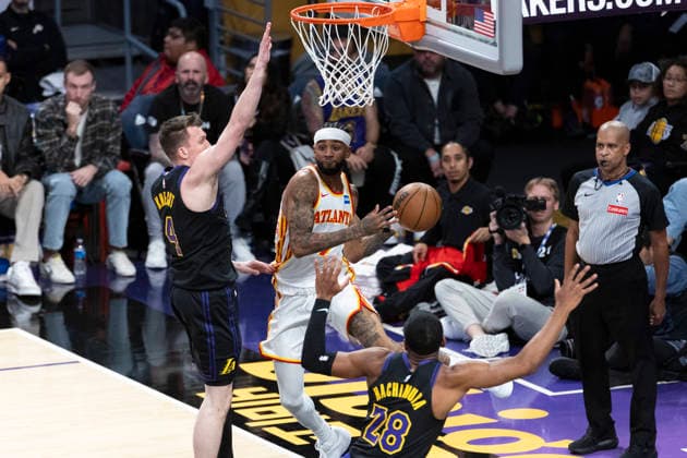 January 13, 2026, Los Angeles, California, United States: Atlanta Hawks Nickeil Alexander-Walker (7) looks to pass while defended by Los Angeles Lakersâ„¢ Dalton Knecht (4) during an NBA, Basketball Herren, USA basketball game at Crypto.com Arena on Tuesday, Jan. 13, 2026 in Los Angeles. Los Angeles United States - ZUMAs197 20260113_aaa_s197_448 Copyright: xRingoxChiux