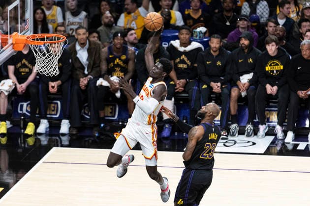 January 13, 2026, Los Angeles, California, United States: Atlanta Hawks Mouhamed Gueye (18) goes past Los Angeles Lakersâ„¢ LeBron James (23) to the basket during an NBA, Basketball Herren, USA basketball game at Crypto.com Arena on Tuesday, Jan. 13, 2026 in Los Angeles. Los Angeles United States - ZUMAs197 20260113_aaa_s197_452 Copyright: xRingoxChiux