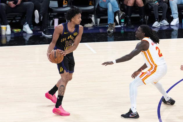 January 13, 2026, Los Angeles, California, United States: Los Angeles Lakersâ„¢ Kobe Bufkin (18) is defended by Atlanta Hawks Keaton Wallace (2) during an NBA, Basketball Herren, USA basketball game at Crypto.com Arena on Tuesday, Jan. 13, 2026 in Los Angeles. Los Angeles United States - ZUMAs197 20260113_aaa_s197_464 Copyright: xRingoxChiux