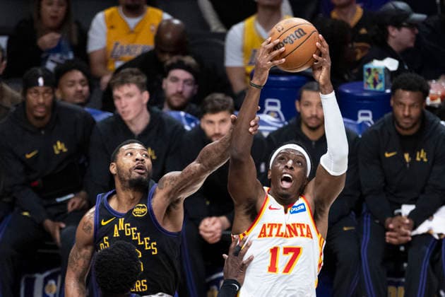 January 13, 2026, Los Angeles, California, United States: Atlanta Hawks Vit Krejci (27) and Los Angeles Lakersâ„¢ Marcus Smart (36) vie for the ball during an NBA, Basketball Herren, USA basketball game at Crypto.com Arena on Tuesday, Jan. 13, 2026 in Los Angeles. Los Angeles United States - ZUMAs197 20260113_aaa_s197_469 Copyright: xRingoxChiux