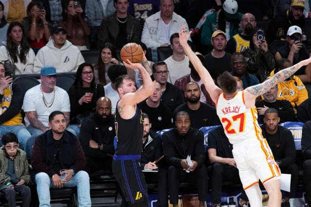 January 13, 2026, Los Angeles, California, United States: Los Angeles Lakersâ„¢ Luka Don?i? (77) shoots against Atlanta Hawks Vit Krejci (27) during an NBA, Basketball Herren, USA basketball game at Crypto.com Arena on Tuesday, Jan. 13, 2026 in Los Angeles. Los Angeles United States - ZUMAs197 20260113_aaa_s197_475 Copyright: xRingoxChiux