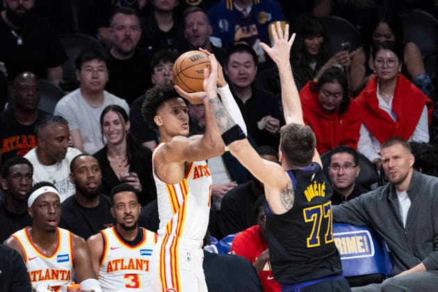 January 13, 2026, Los Angeles, California, United States: Atlanta Hawks Jalen Johnson (1) shoots against Los Angeles Lakersâ„¢ Luka Don?i? (77) during an NBA, Basketball Herren, USA basketball game at Crypto.com Arena on Tuesday, Jan. 13, 2026 in Los Angeles. Los Angeles United States - ZUMAs197 20260113_aaa_s197_480 Copyright: xRingoxChiux