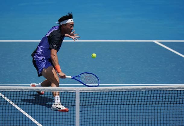 (260114) -- MELBOURNE, Jan. 14, 2026 -- Coleman Wong of China s Hong Kong hits a return during the men s singles qualifying 2nd round match against Pablo Llamas Ruiz of Spain at Australian Open tennis tournament in Melbourne, Australia, Jan. 14, 2026. (Photo by Xinhua) (SP)AUSTRALIA-MELBOURNE-TENNIS-AUSTRALIAN OPEN-MEN S SINGLES-QUALIFYING WangxShen 
