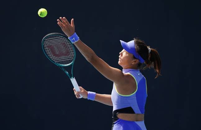 (260114) -- MELBOURNE, Jan. 14, 2026 -- Yuan Yue of China serves during the women s singles qualifying 2nd round match against Maria Lourdes Carle of Argentina at Australian Open tennis tournament in Melbourne, Australia, Jan. 14, 2026. (Photo by Xinhua) (SP)AUSTRALIA-MELBOURNE-TENNIS-AUSTRALIAN OPEN-WOMEN S SINGLES-QUALIFYING WangxShen 
