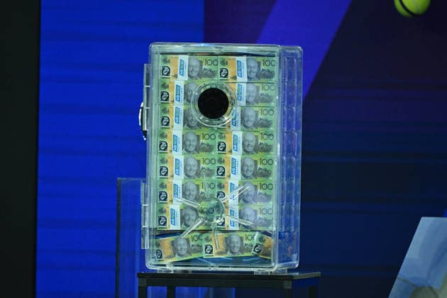 TENNIS AO 1 POINT SLAM, A box of one hundred dollar bank notes with Tennis Australia CEO, Craig Tiley face printed on them at the 1 Point Slam event during the Australian Open Opening Week at Rod Laver Arena in Melbourne, Victoria, Wednesday, January 14, 2026. ( NO ARCHIVING, EDITORIAL USE ONLY Melbourne Victoria Australia  Copyright: xJamesxRossx 20260114180636379780