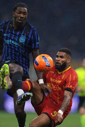 Milan, Italy, 14th January 2026. Marcus Thuram of FC Internazionale clashes with Jamil Siebert of US Lecce during the Internazionale vs Lecce Serie A match at Giuseppe Meazza, Milan. Picture credit should read: Jonathan Moscrop Sportimage EDITORIAL USE ONLY. No use with unauthorised audio, video, data, fixture lists, club league logos or live services. Online in-match use limited to 120 images, no video emulation. No use in betting, games or single club league player publications. SPI_064_JM_INTER_LECCE_ SPI-4413-0064