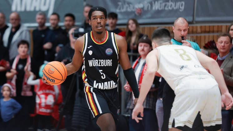 In the picture from left Marcus Carr Wuerzburg Baskets, 5 on the ball against Novak Music Patrioti Levice, 8 14 01 2026, Fitness First Wuerzburg Baskets vs Patrioti Levice, Basketball Champions League, Play Ins, Game 3, Germany, 97072, tectake Arena Wuerzburg, Copyright: HMBxMedia xJulienxBecker