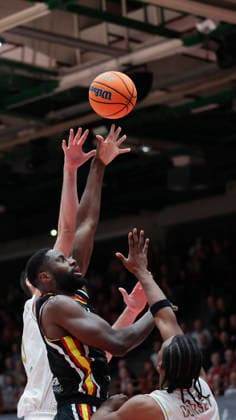 In the picture from left Boris Bojanovsky Patrioti Levice, 15 , Eddy Edigin Wuerzburg Baskets, 27 and Gabe Dorse Patrioti Levice, 7 14 01 2026, Fitness First Wuerzburg Baskets vs Patrioti Levice, Basketball Champions League, Play Ins, Game 3, Germany, 97072, tectake Arena Wuerzburg, Copyright: HMBxMedia xJulienxBecker