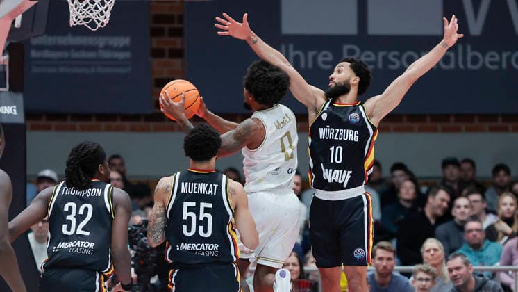 In the picture from left Charles Thompson Wuerzburg Baskets, 32 , David Muenkat Wuerzburg Baskets, 55 , Rickey McGill Patrioti Levice, 0 and Davion Mintz Wuerzburg Baskets, 10 14 01 2026, Fitness First Wuerzburg Baskets vs Patrioti Levice, Basketball Champions League, Play Ins, Game 3, Germany, 97072, tectake Arena Wuerzburg, Copyright: HMBxMedia xJulienxBecker