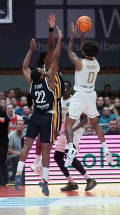 In the picture from left Johnathan Stove Wuerzburg Baskets, 22 and Charles Thompson Wuerzburg Baskets, 32 against Rickey McGill Patrioti Levice, 0 14 01 2026, Fitness First Wuerzburg Baskets vs Patrioti Levice, Basketball Champions League, Play Ins, Game 3, Germany, 97072, tectake Arena Wuerzburg, Copyright: HMBxMedia xJulienxBecker