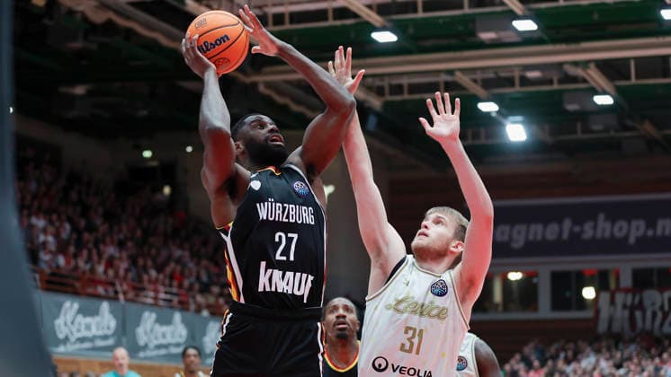 In the picture from left Eddy Edigin Wuerzburg Baskets, 27 on the ball against Samuel Solcansky Patrioti Levice, 31 14 01 2026, Fitness First Wuerzburg Baskets vs Patrioti Levice, Basketball Champions League, Play Ins, Game 3, Germany, 97072, tectake Arena Wuerzburg, Copyright: HMBxMedia xJulienxBecker