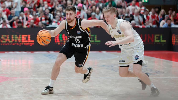 In the picture from left Ryan Schwieger Wuerzburg Baskets, 15 on the ball against Aatu Kivimaki Patrioti Levice, 12 14 01 2026, Fitness First Wuerzburg Baskets vs Patrioti Levice, Basketball Champions League, Play Ins, Game 3, Germany, 97072, tectake Arena Wuerzburg, Copyright: HMBxMedia xJulienxBecker