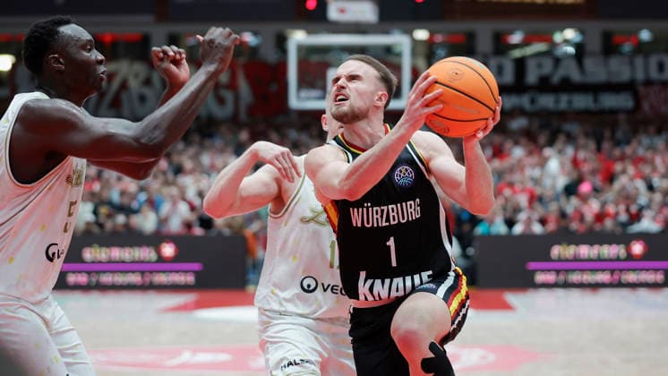 In the picture from left Akol Mawein Patrioti Levice, 55 , Aatu Kivimaki Patrioti Levice, 12 and Lukas Herzog Wuerzburg Baskets, 1 14 01 2026, Fitness First Wuerzburg Baskets vs Patrioti Levice, Basketball Champions League, Play Ins, Game 3, Germany, 97072, tectake Arena Wuerzburg, Copyright: HMBxMedia xJulienxBecker