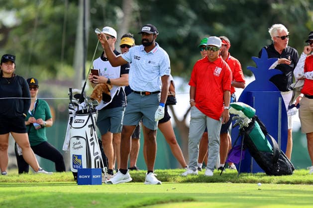 January 14, 2026 - Sahith Teegala and University of Hawaii Rainbow Warrior Football Quarterback Micah Alejado on the 7th tee during a Pro-Am prior to the 2026 Sony Open in Hawaii at Waialae Country Club in Honolulu, HI - CSM Honolulu USA - ZUMAc04_ 20260114_zma_c04_172 Copyright: xAndrewxLeex