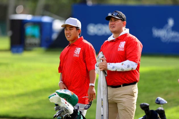 January 14, 2026 - University of Hawaii Rainbow Warrior Football Quarterback Micah Alejado with his caddie and Head Coach Timmy Chang during a Pro-Am prior to the 2026 Sony Open in Hawaii at Waialae Country Club in Honolulu, HI - CSM Honolulu USA - ZUMAc04_ 20260114_zma_c04_181 Copyright: xAndrewxLeex