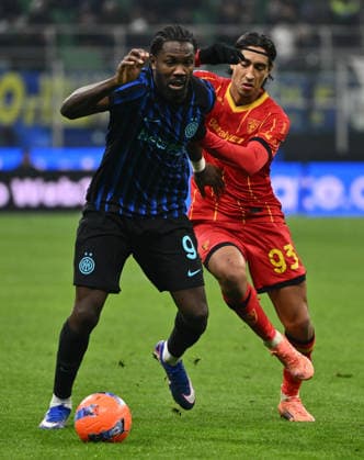 (260115) -- MILAN, Jan. 15, 2026 -- Inter Milan s Marcus Thuram (L) vies with Lecce s Youssef Maleh during a Serie A football match between Inter Milan and Lecce in Milan, Italy, Jan. 14, 2026. (Photo by Xinhua) (SP)ITALY-MILAN-FOOTBALL-SERIE A-INTER MILAN VS LECCE AlbertoxLingria 