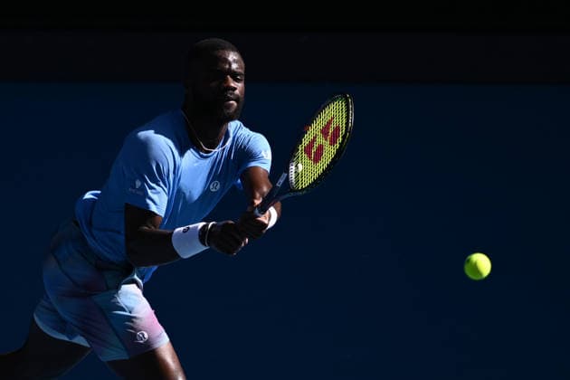 TENNIS AUSTRALIAN OPEN, Frances Tiafoe of the US in action against Novak Djokovic of Serbia during a charity match ahead of the Australian Open tennis tournament at Melbourne Park in Melbourne, Thursday, January 15, 2026. ( NO ARCHIVING, EDITORIAL USE ONLY MELBOURNE VICTORIA AUSTRALIA  Copyright: xJOELxCARRETTx 20260115116747887636