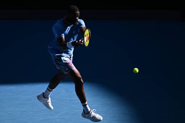 TENNIS AUSTRALIAN OPEN, Novak Djokovic of Serbia in action against Frances Tiafoe of the US during a charity match ahead of the Australian Open tennis tournament at Melbourne Park in Melbourne, Thursday, January 15, 2026. ( NO ARCHIVING, EDITORIAL USE ONLY MELBOURNE VICTORIA AUSTRALIA  Copyright: xJOELxCARRETTx 20260115158452595950
