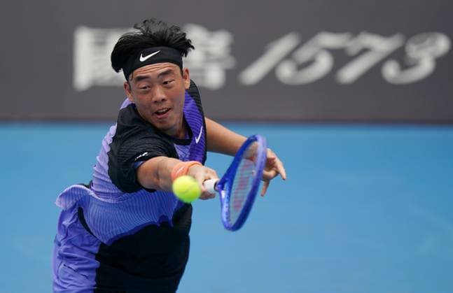 (260115) -- MELBOURNE, Jan. 15, 2026 -- Coleman Wong of China s Hong Kong hits a return during the men s singles qualifying final round match against Elias Ymer of Sweden at Australian Open tennis tournament in Melbourne, Australia, Jan. 15, 2026. (Photo by Xinhua) (SP)AUSTRALIA-MELBOURNE-TENNIS-AUSTRALIAN OPEN-MEN S SINGLES-QUALIFYING WangxShen 