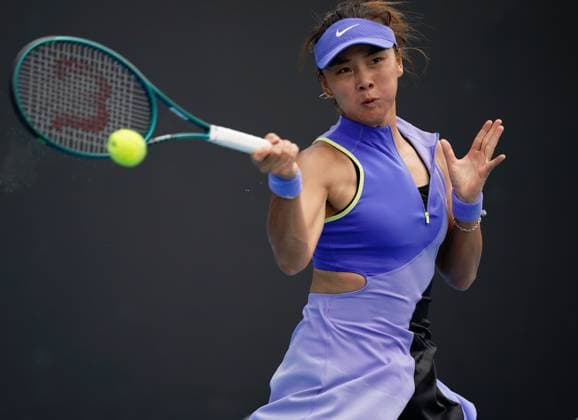 (260115) -- MELBOURNE, Jan. 15, 2026 -- Yuan Yue of China hits a return during the women s singles qualifying final round match against Tamara Zidansek of Slovenia at Australian Open tennis tournament in Melbourne, Australia, Jan. 15, 2026. (Photo by Xinhua) (SP)AUSTRALIA-MELBOURNE-TENNIS-AUSTRALIAN OPEN-WOMEN S SINGLES-QUALIFYING WangxShen 